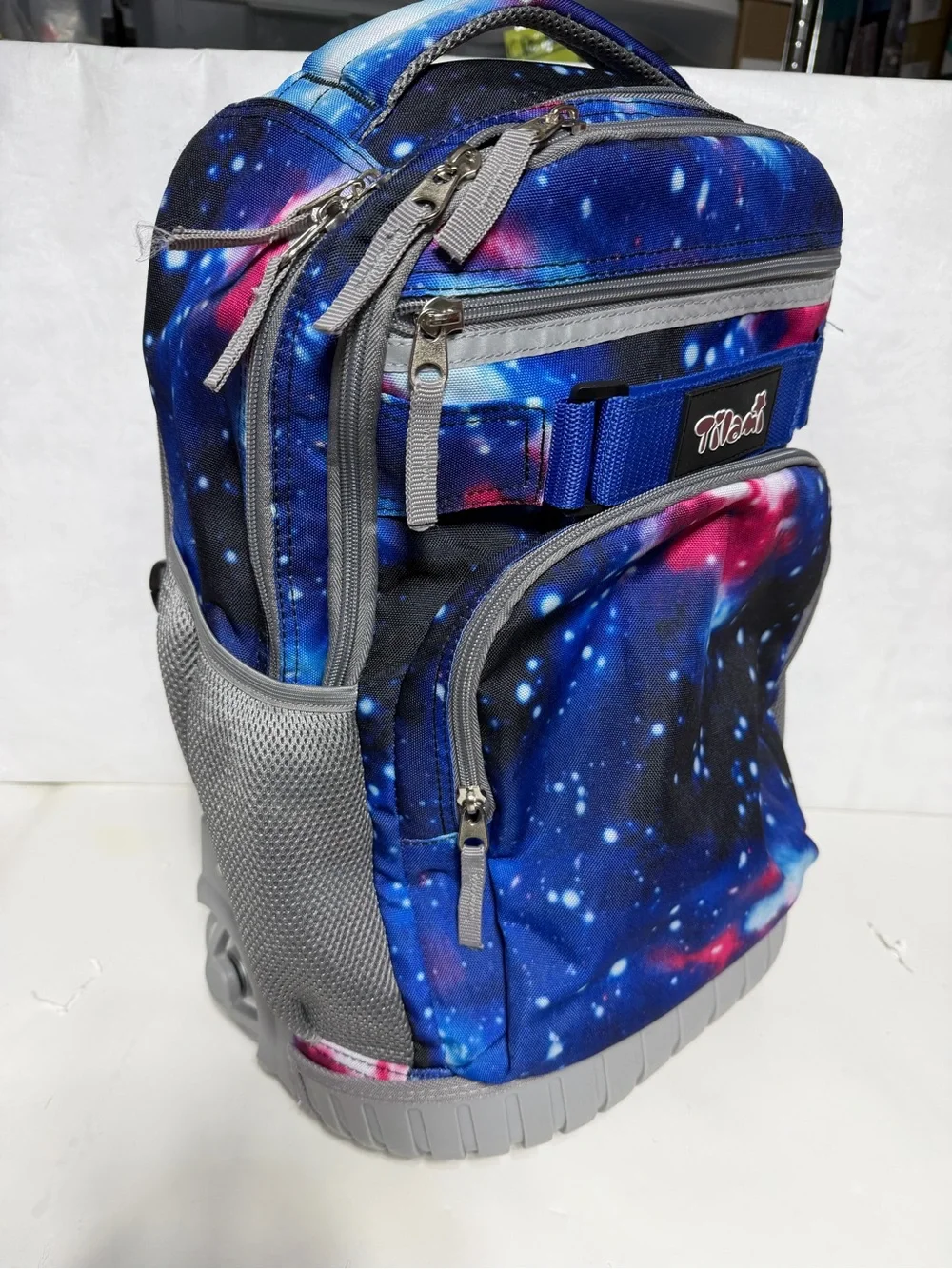 Tilami Deep Blue Galaxy Rolling Backpack 19 inch - pre owned condition